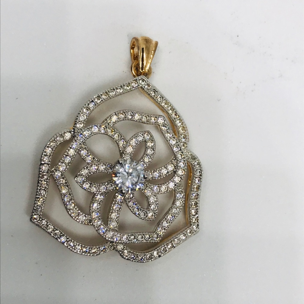 Gold and diamond pendant